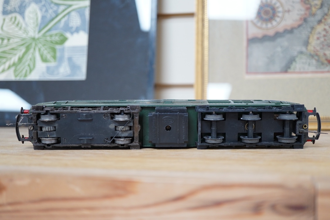 A quantity of 00 gauge railway by various makes, comprising; nine locomotives by Tri-ang, Hornby Dublo, etc. (one missing tender), sixteen maroon bogie coaches and eighteen freight wagons